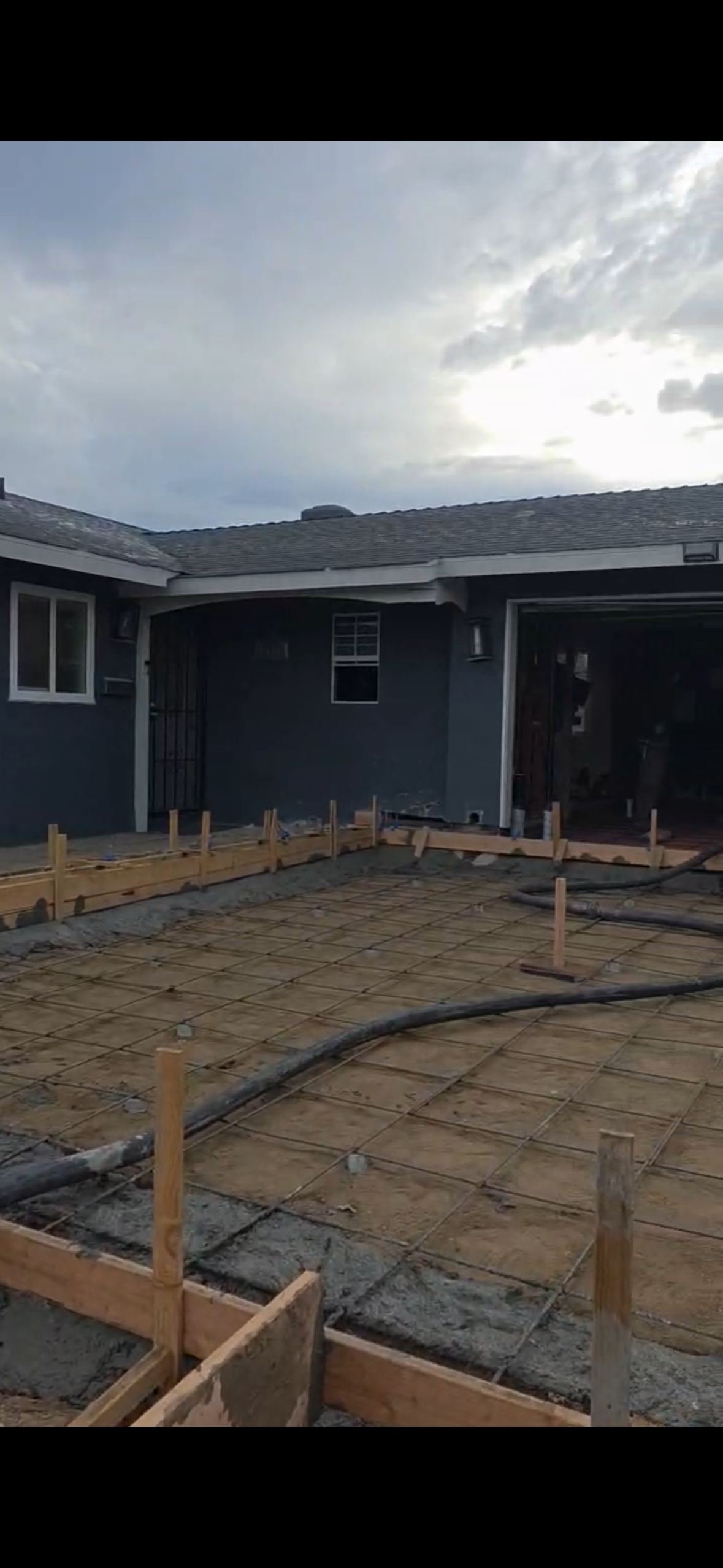 Concrete driveway formed and reinforced with a rebar grid, ready for the pour, in Vista California