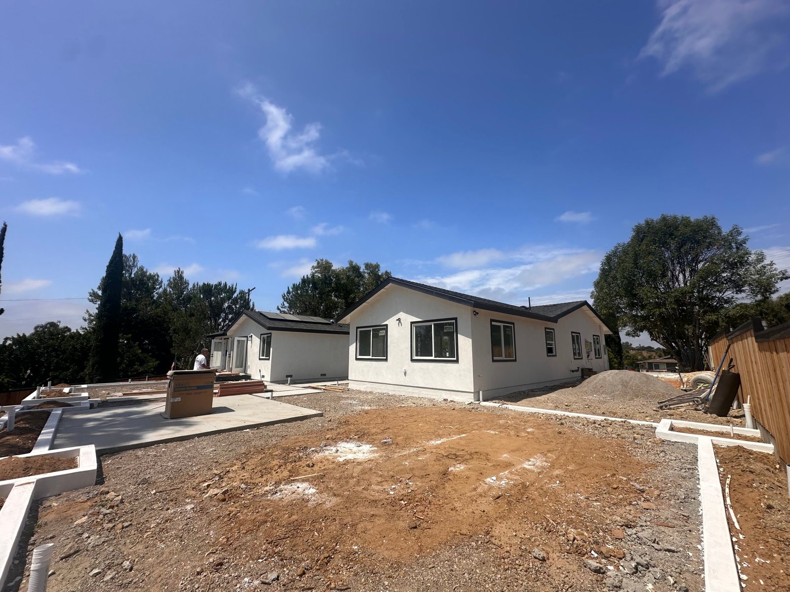 Detached ADU with stucco and roofing complete during construction in Vista, California