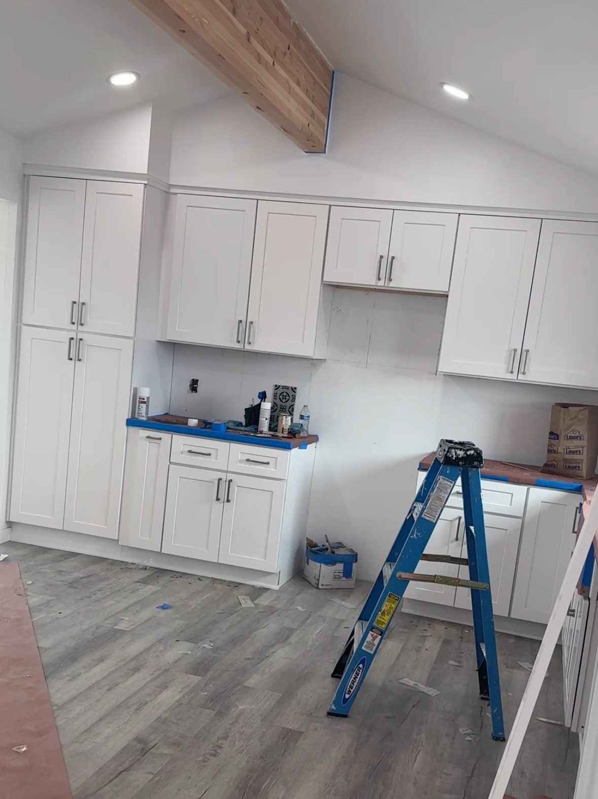 ADU interior build-out with new cabinetry and vaulted ceiling
