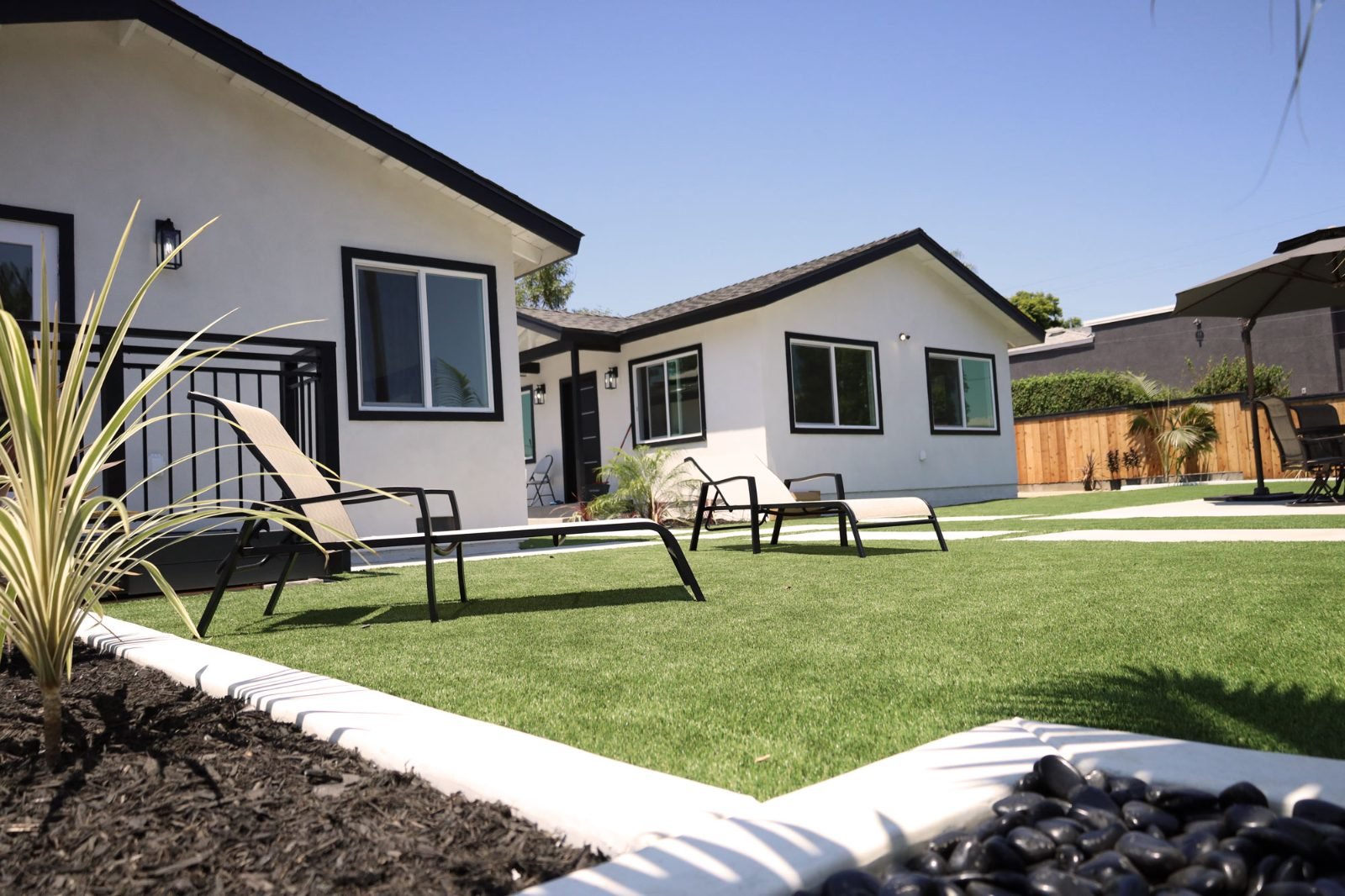 Completed backyard ADU and landscaped yard in North County San Diego