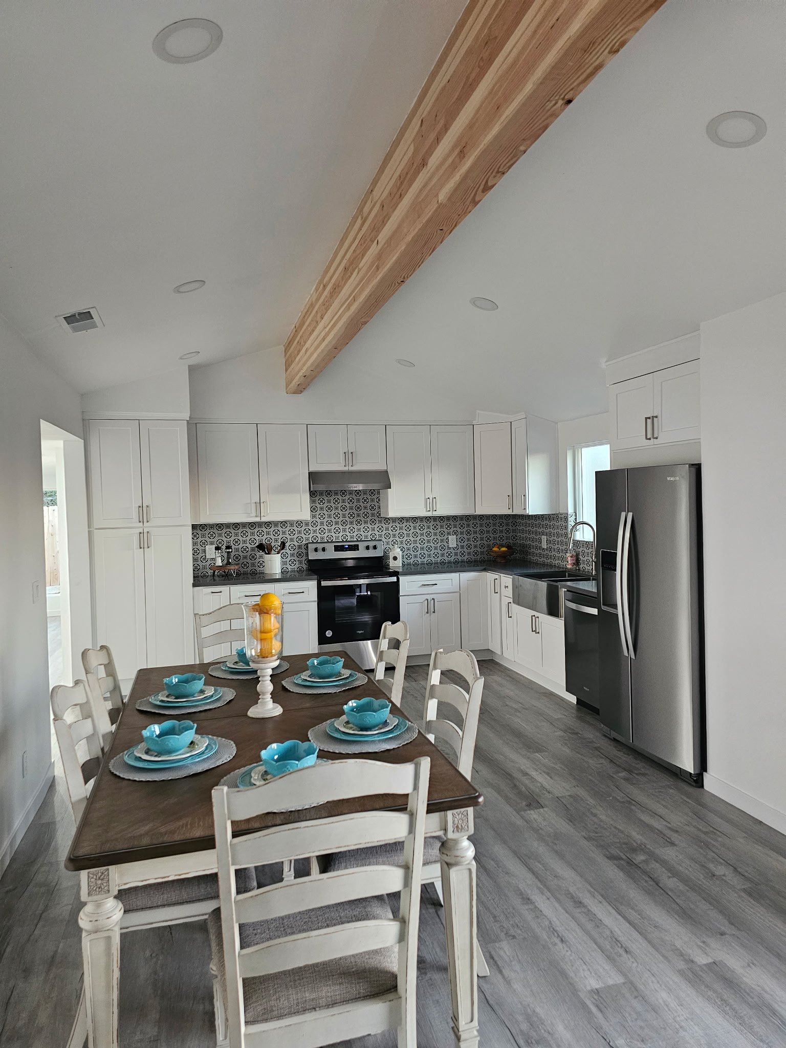 Farmhouse kitchen remodel with patterned backsplash and apron sink